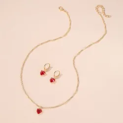 Golden necklace & earrings set with red heart
