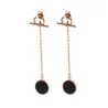 Chain with a black circle - long earringsEarrings