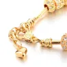 Elegant gold bracelet - with crystal beads & heart