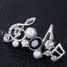 Crystal musical notes - elegant brooch