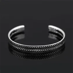Stainless steel bracelet - with leaf pattern - open design - unisex