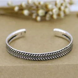 Stainless steel bracelet - with leaf pattern - open design - unisex