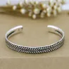 Stainless steel bracelet - with leaf pattern - open design - unisex