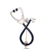 Stethoscope shaped brooch with crystal