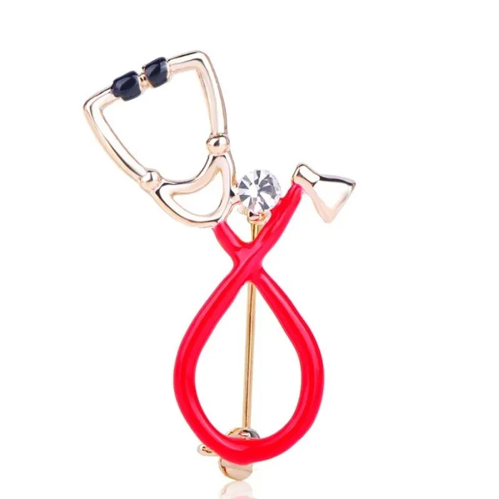 Stethoscope shaped brooch with crystal