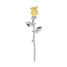 Elegant silver brooch with a golden rose