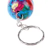 Trendy keychain with world map globe