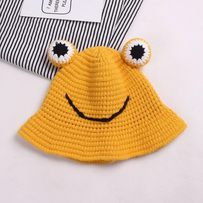 Warm knitted hat - bucket style - with toad's eyes