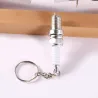 Spark plug keychain with LEDKeyrings