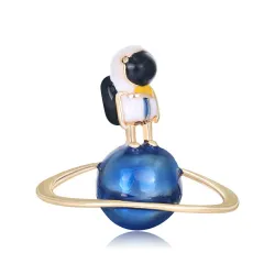 Stylish brooch with astronaut / globeBrooches