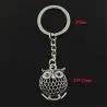 Vintage silver keychain - branch standing owlKeyrings