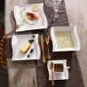 Elegant tableware - white porcelain dinner set - cups - saucers - platesCutlery