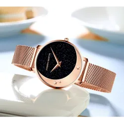 Elegant Quartz-klokke - mesh-rem i rustfritt stål - måne / stjerner
