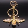 Golden keychain with a crystal beeKeyrings