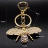 Golden keychain with a crystal beeKeyrings