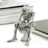 Skeleton sitting on the toilet - rubber keychainKeyrings