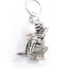 Skeleton sitting on the toilet - rubber keychainKeyrings