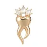 Tooth with a crystal crown - broochBrooches