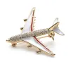 Crystal airplane brooch