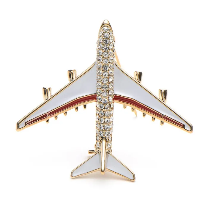 Crystal airplane brooch