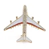 Crystal airplane brooch