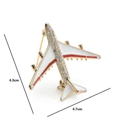 Crystal airplane brooch