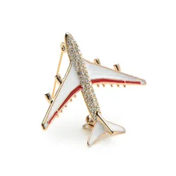 Crystal airplane brooch