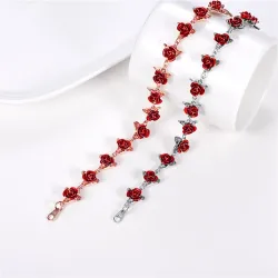 Gold & silver bracelet with red rosesBracelets