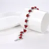 Gold & silver bracelet with red rosesBracelets