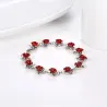 Gold & silver bracelet with red rosesBracelets