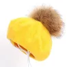 Elegant beret with fur pom-pom