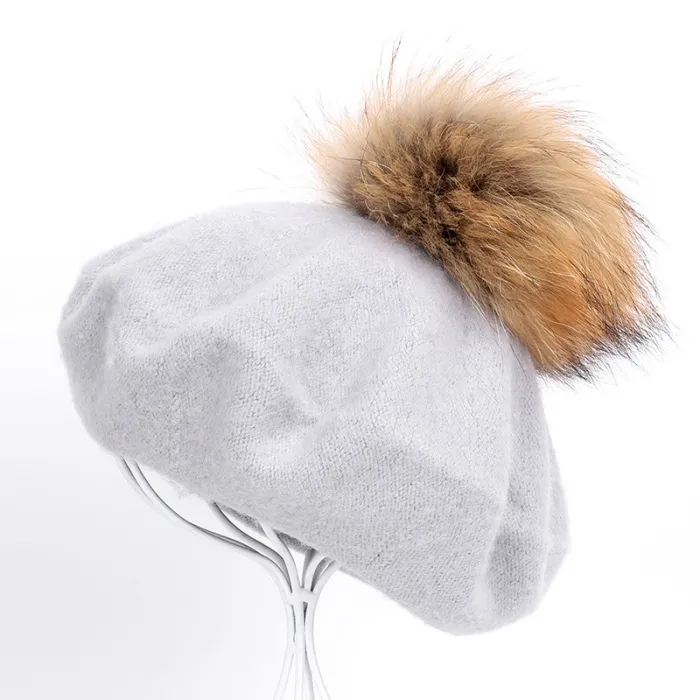 Elegant beret with fur pom-pom